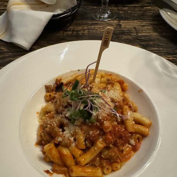 Pane E Vino signature dishes Maiale (Pork Shank)Cavatelli alla NormaPollo Scarpariello